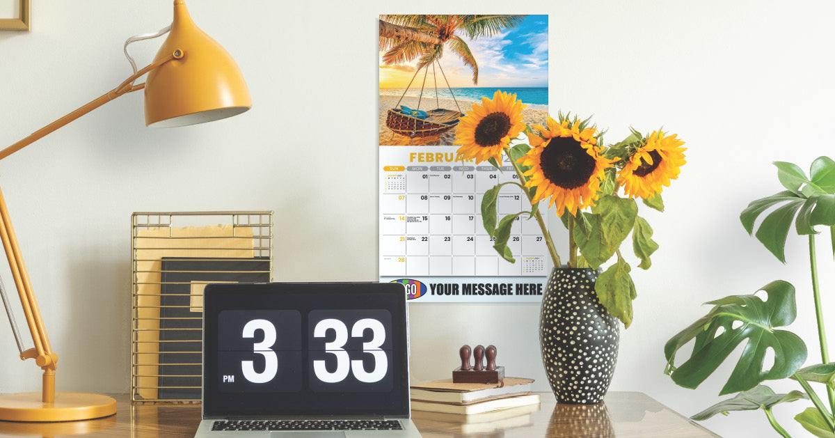 Beach themed wall calendar with space for branding with business information.